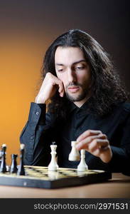 Chess player playing his game