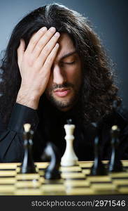 Chess player playing his game