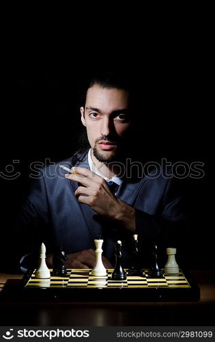 Chess player playing his game