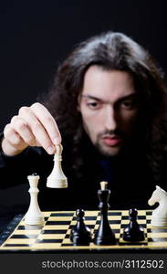 Chess player playing his game