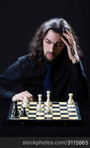 Chess player playing his game