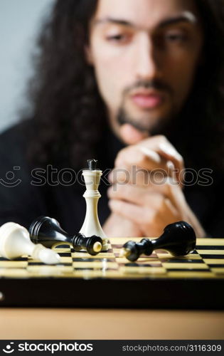 Chess player playing his game