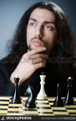 Chess player playing his game