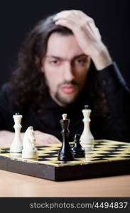 Chess player playing his game