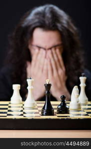 Chess player playing his game