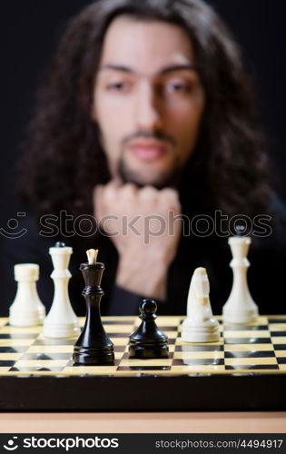 Chess player playing his game