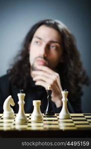 Chess player playing his game