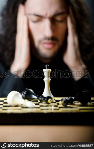 Chess player playing his game