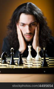 Chess player playing his game