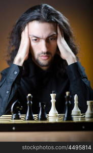 Chess player playing his game