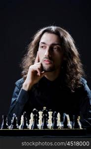Chess player playing his game