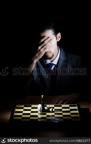 Chess player playing his game