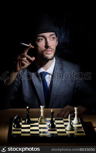 Chess player playing his game