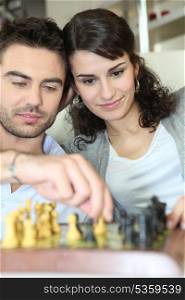 Chess playing couple