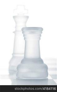 chess rook is defending king, cut out from white