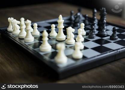 Chess set on the chess board of business ideas and competition and stratagy plan success meaning