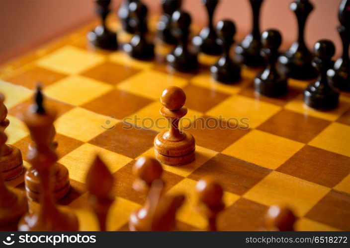 Chessboard with figures on dark background. Chessboard with figures