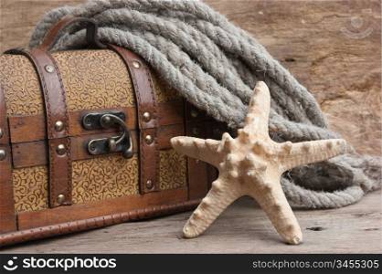 chest and starfish, still life