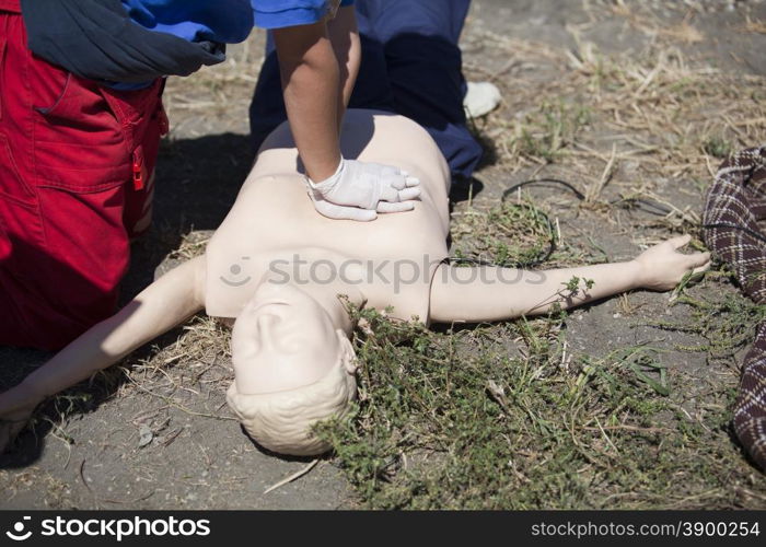 Chest massage performed on CPR dummy