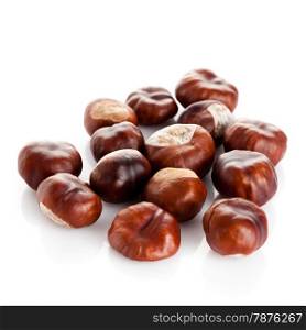 Chestnut on white background. ripe chestnuts