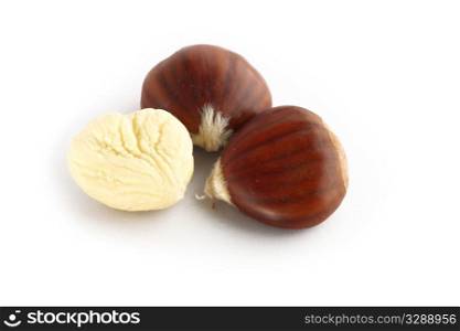 Chestnuts over a white background.