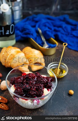 chia desert with blackberry jam and nuts