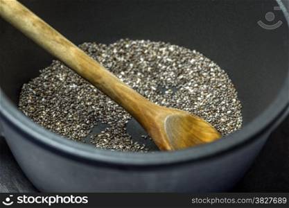 Chia-roasted. Chia seeds in a pan - roasted chia seeds tastes good on salad