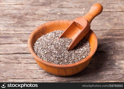 chia seeds close up in a wooden bowl. chia seeds