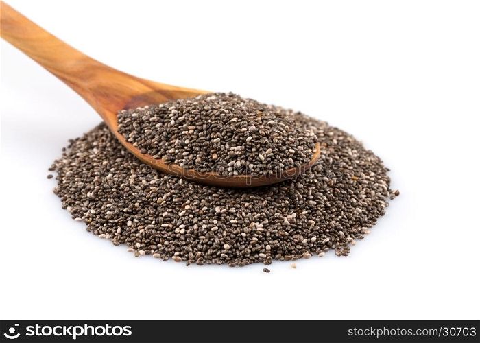 Chia seeds in wooden spoon on white background