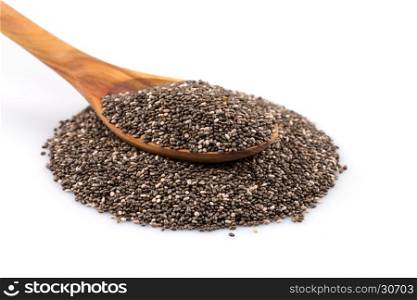 Chia seeds in wooden spoon on white background