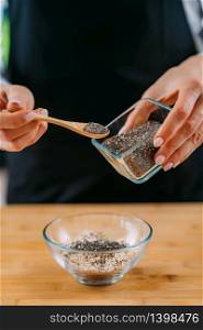 Chia Seeds, superfood rich in fats, proteins, minerals, vitamins and dietary fibers. Making Oatmeal with Chia Seeds