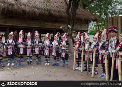 "Chiang Mai, Thailand - January 11, 2017: Thailand akha hill tribe waiting to perform traditional dance show for tourist in "following the king on highland festival" in Chiang Mai, Thailand on January 11, 2017."