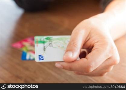 CHIANG RAI, THAILAND - March 3, 2016: Woman&rsquo;s hand holding visa card, stock photo