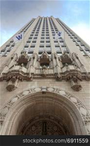 Chicago, IL, USA, october 28, 2016: Bottom view of the Tribune Tower in Chicago. It is a neo-Gothic structure and the home of the Chicago Tribune