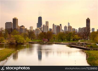 Chicago, Illinois, United States - Downtown skyline and South Pond at Lincoln Park.