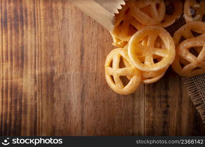 Chicharrones de Harina. Also known as duros, duritos, Mexican wagon wheels or pinwheels, they are a very popular snack made from flour, commonly accompanied with hot sauce and lemon juice.