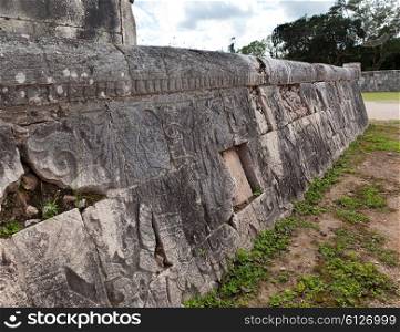 Chichen Itza . Fragment of a wall of a pyramid with an ancient ornament. Yucatan, Mexico