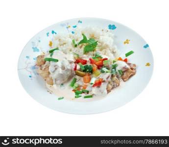 Chicken ala King - King-style Chicken. diced chicken in a cream sauce, and often with mushrooms, and vegetables, served over rice