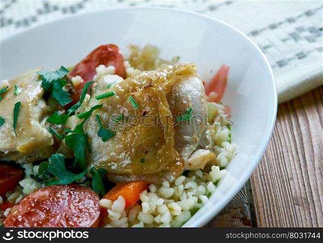 Chicken and chorizo rice pot. chicken casserole for sharing, flavoured with Spanish sausage.