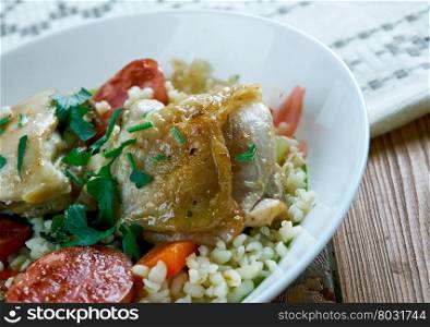 Chicken and chorizo rice pot. chicken casserole for sharing, flavoured with Spanish sausage.