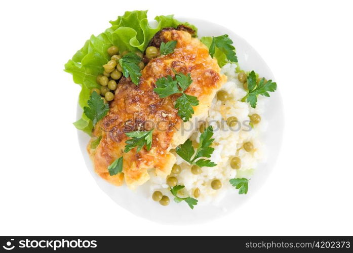 Chicken baked with pineapple and cheese very tasty dish with rice vegetables garnish