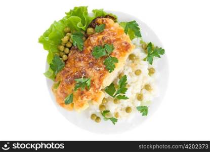 Chicken baked with pineapple and cheese very tasty dish with rice vegetables garnish