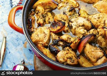 Chicken breast baked in orange sauce. Food for Christmas.. Pieces of chicken fillet in oranges.
