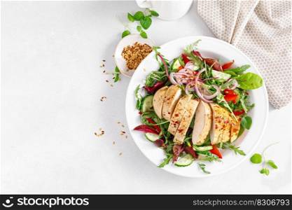 Chicken breast grilled and fresh vegetable salad