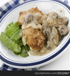 Chicken Breast In Mushroom Sauce With Green Peas