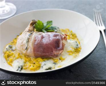 Chicken Breast wrapped in Parma Ham with Gorgonzola Cheese and Risotto Milanaise