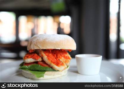 Chicken burger with chili sauce