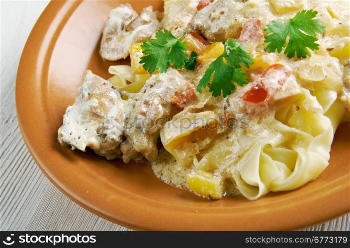 Chicken carbonara. fettucine pasta and creamy Pecorino Romano