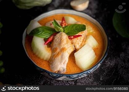 Chicken curry with winter melon, with mushroom, garlic, chilli and basil.