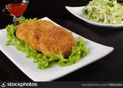 Chicken cutlet breaded in lettuce leaves